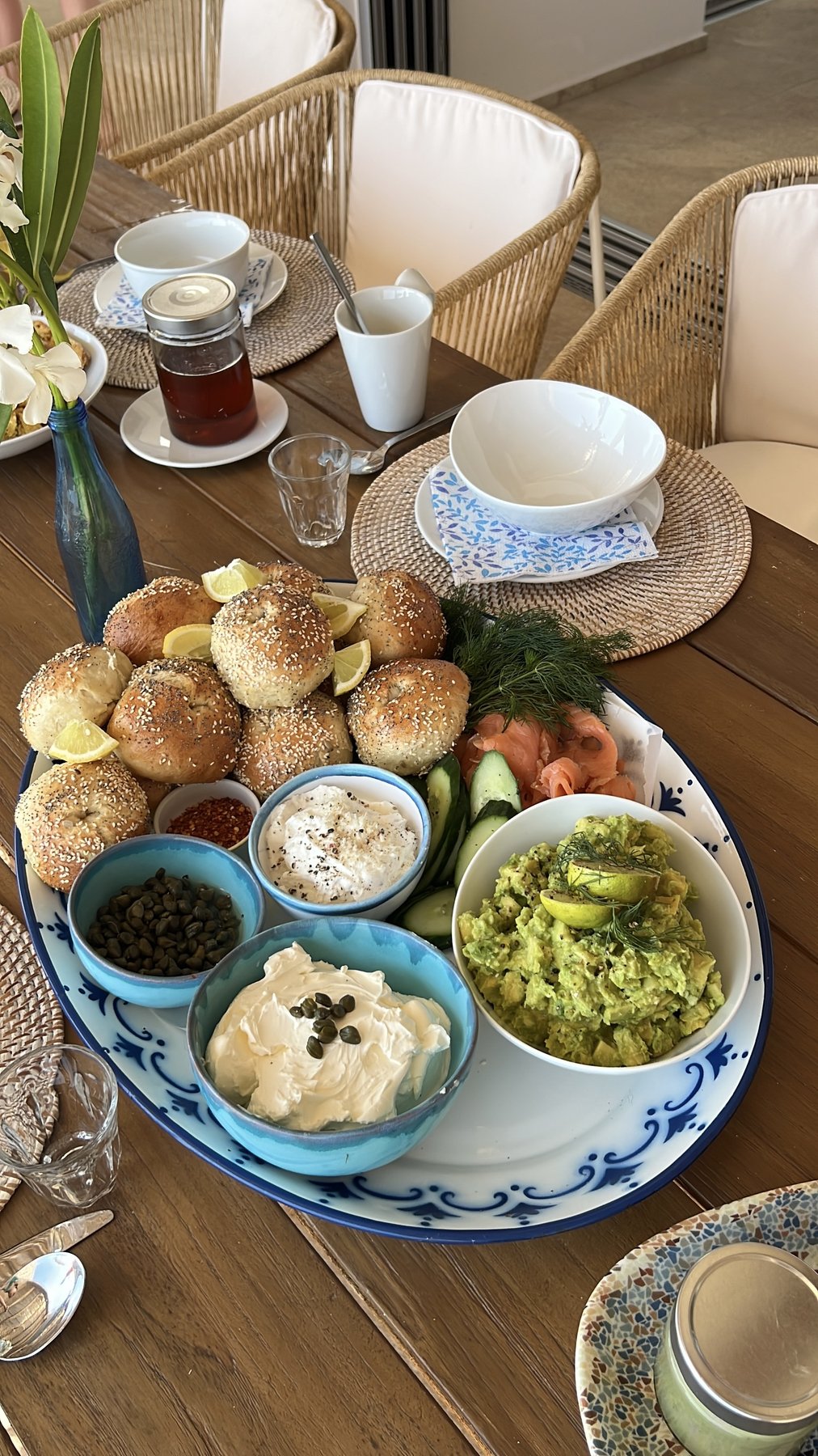 Brunch platter with fresh bagels, salmon and avocado