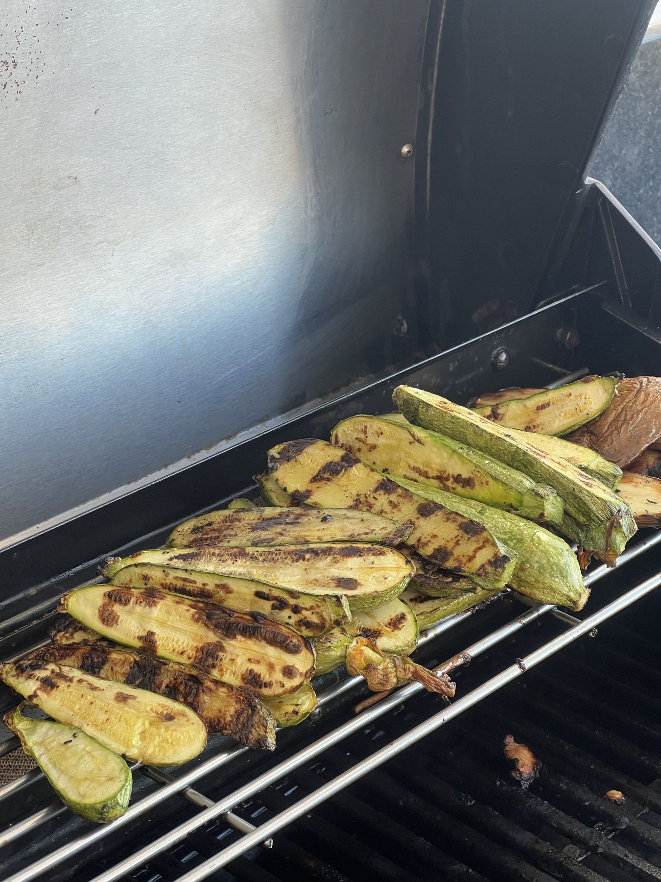 Courgettes cooking on the outdoor grill