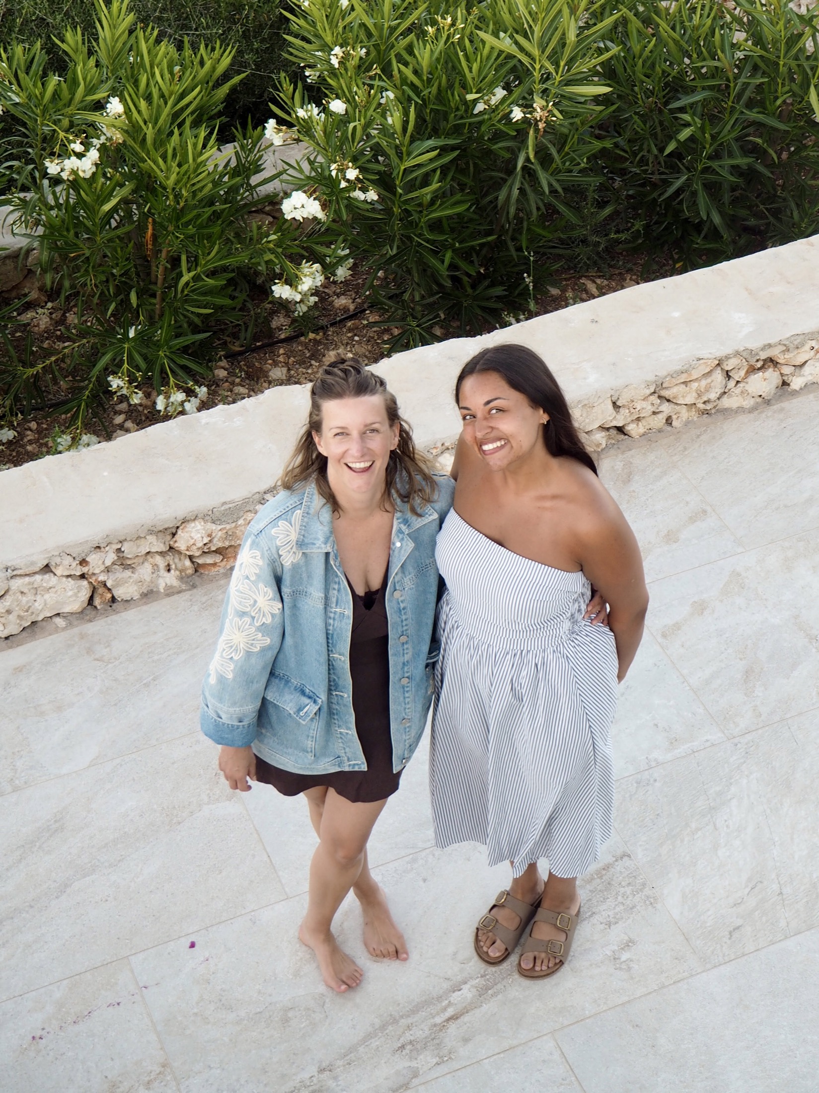 Two Salted Soul guests smiling together at the villa
